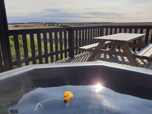 Apartment, 1 Bedroom, Hot Tub | Private spa tub - Ocean Break Cabins (Suðurnesjabær)