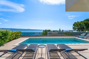 A heated pool - Luxury, seafront Villa IVAN with heated pool only 100m from the beach (Omis)