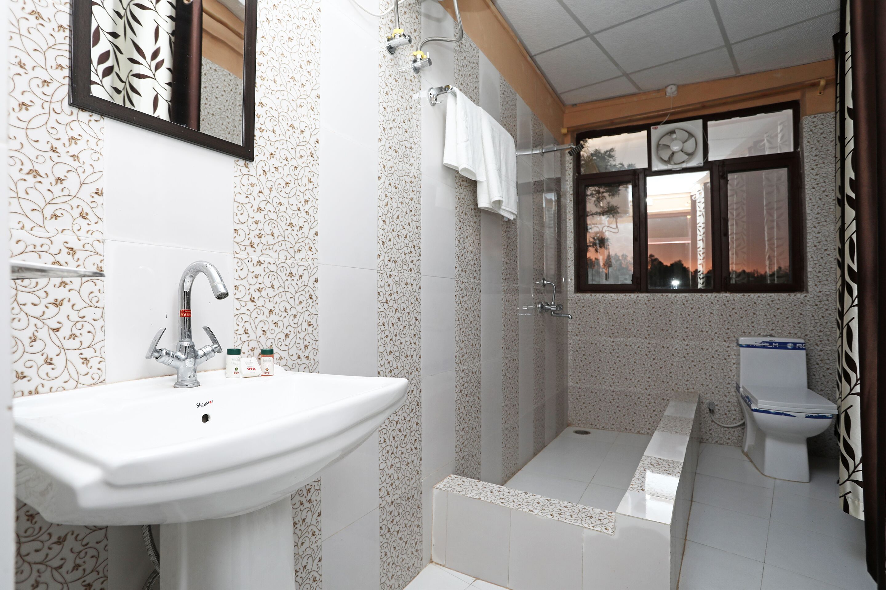 Shower, towels, soap, shampoo