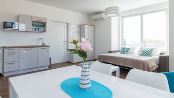 Comfort Apartment (A5) | Living room | Flat-screen TV