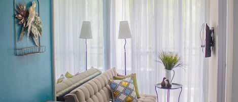 Deluxe-Apartment, 1 Doppelbett und Schlafsofa | Wohnbereich | Flachbildfernseher