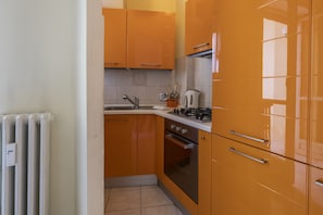 Apartment, 1 Bedroom | Private kitchenette | Full-sized fridge, oven, stovetop, cookware/dishes/utensils