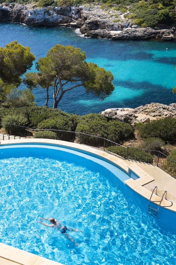 Indoor pool, outdoor pool, pool umbrellas, sun loungers