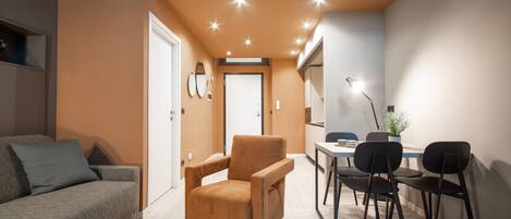 Apartment, 1 Bedroom | Living area | Flat-screen TV