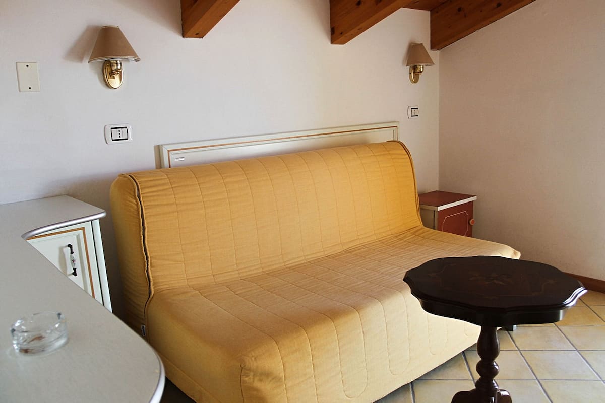 Suite, vista mare | Area soggiorno