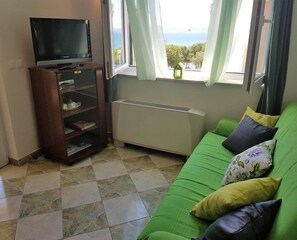 Leilighet (Green) | Oppholdsrom | LCD-TV