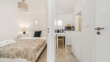 1 chambre, fer et planche Ă repasser, Wi-Fi gratuit, draps fournis