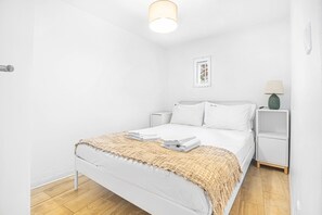 1 habitación, tabla de planchar con plancha, wifi gratis y ropa de cama 