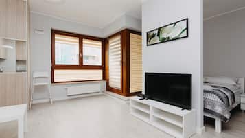 Business Apartment, Balcony | Living area | Flat-screen TV