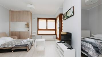 Business Apartment, Balcony | Living area | Flat-screen TV