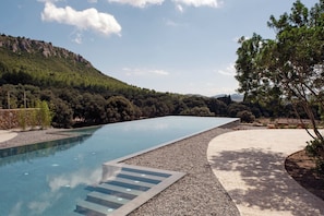 Indoor pool, seasonal outdoor pool, pool umbrellas, sun loungers