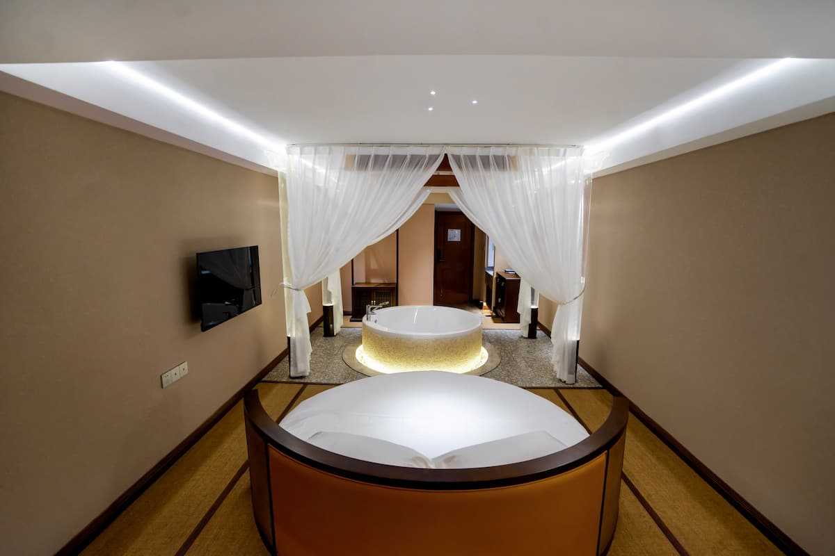 Premium bedding, memory foam beds, minibar, desk