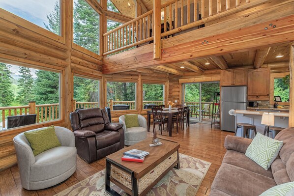 Flat-screen TV, DVD player, books, video library