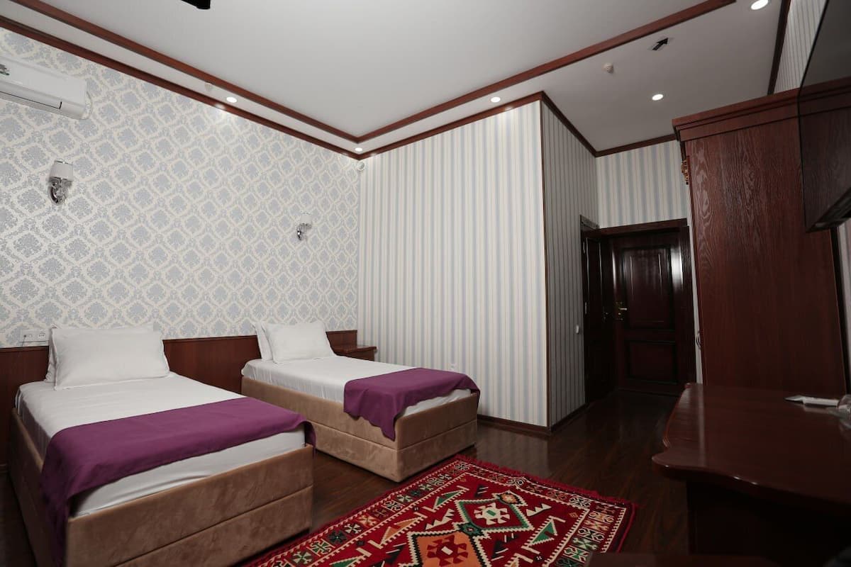 Deluxe Double or Twin Room | 1 bedroom, minibar, in-room safe, desk