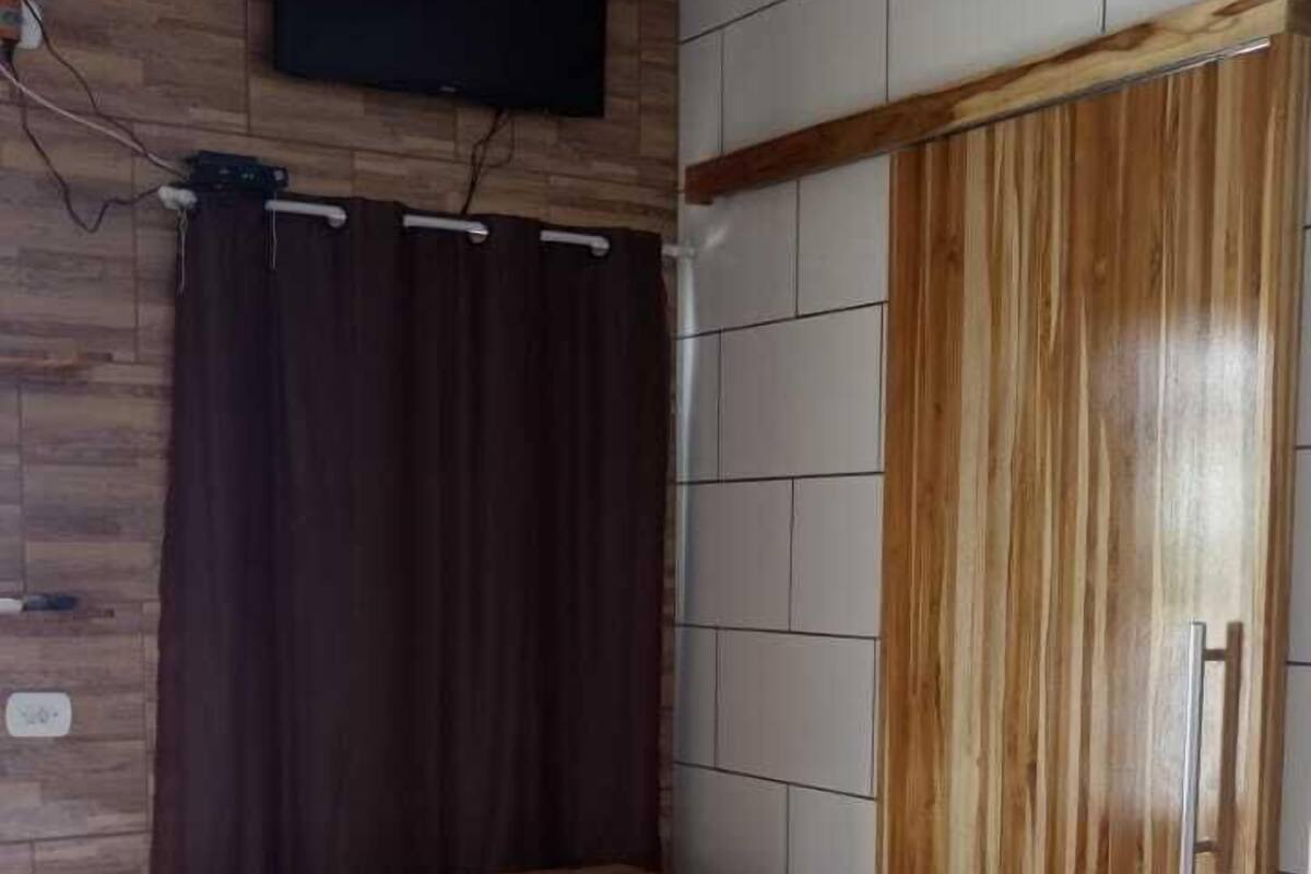 Minibar, desk, blackout curtains, iron/ironing board