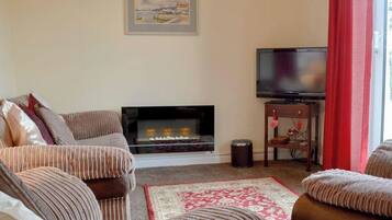 30-inch flat-screen TV with digital channels, TV