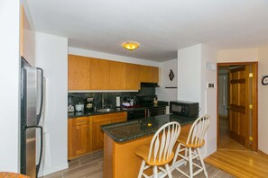 Coffee/tea maker, fridge, oven, toaster - Two Bedroom Discovery Bay High Rise Condos with Lanai & Gorgeous Views (Honolulu)