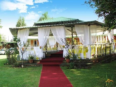 Outdoor wedding area. The Homestead Guest House and S-Catering