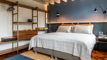 Habitación Deluxe | Ropa de cama de alta calidad y edredones de plumas