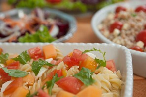 Breakfast, lunch, dinner served; local cuisine
