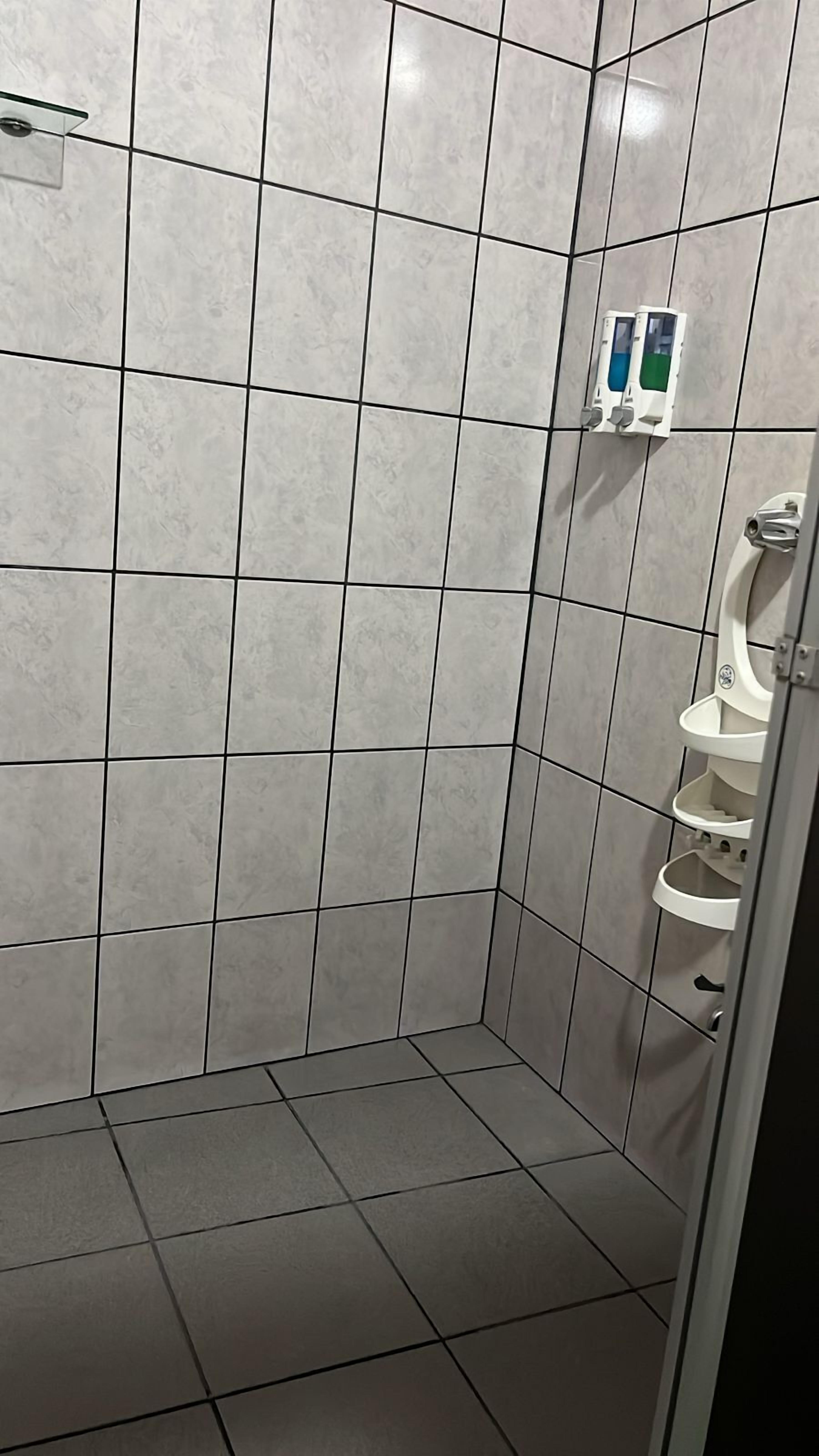 Shower, rainfall showerhead, hair dryer, towels