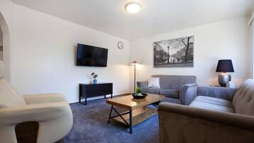 House | Living room | 50-inch flat-screen TV with digital channels, TV, streaming services