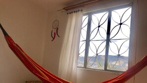 Economy Double Room | Bed sheets - Hostal Casa Lantana Suesca (Suesca)