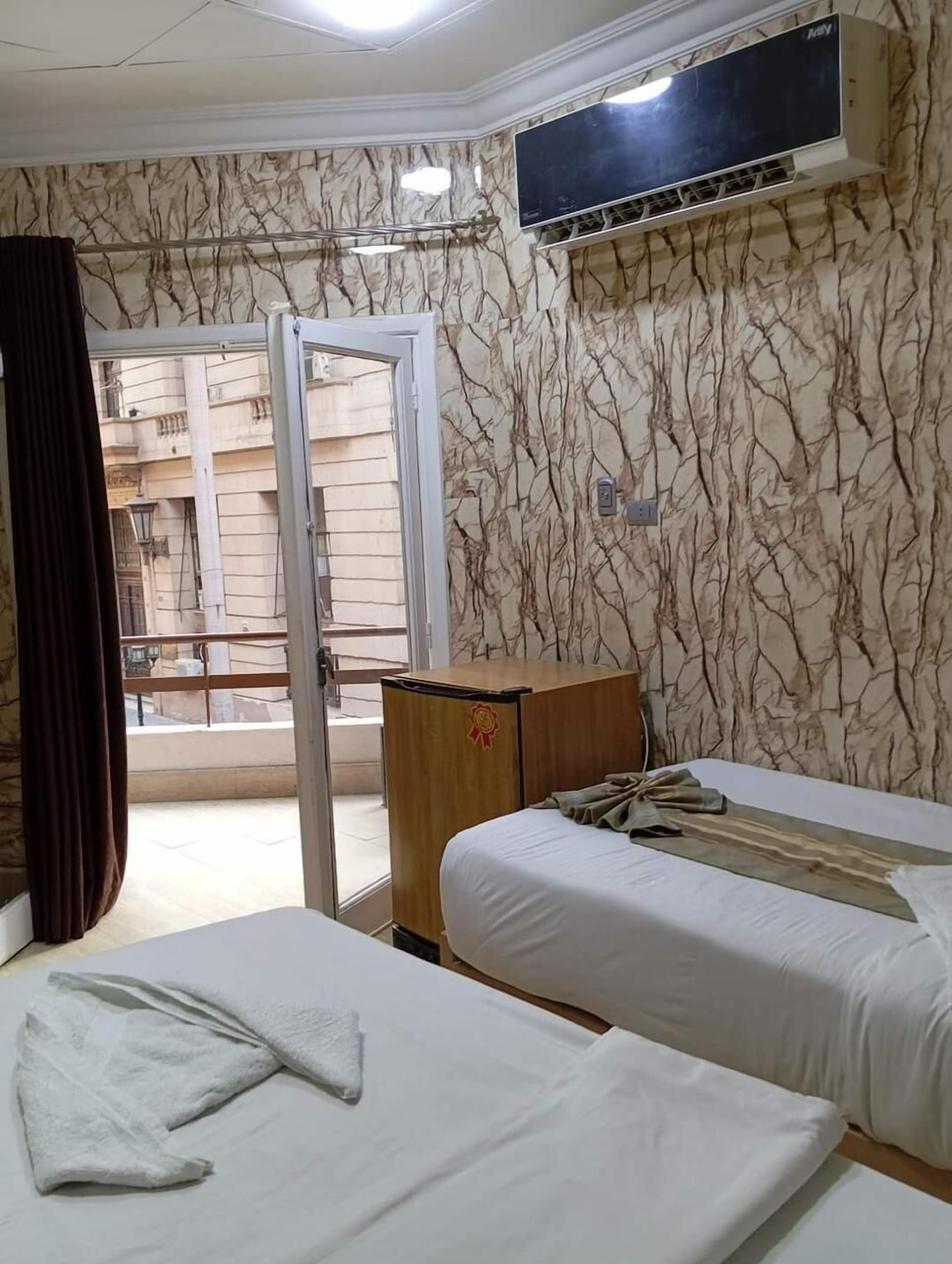 Habitación Deluxe doble | Caja fuerte, sistema de insonorización, wifi gratis y ropa de cama