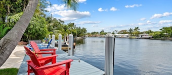 Welcome to Three Palms, A Charming Waterway Villa with Terrific Location!