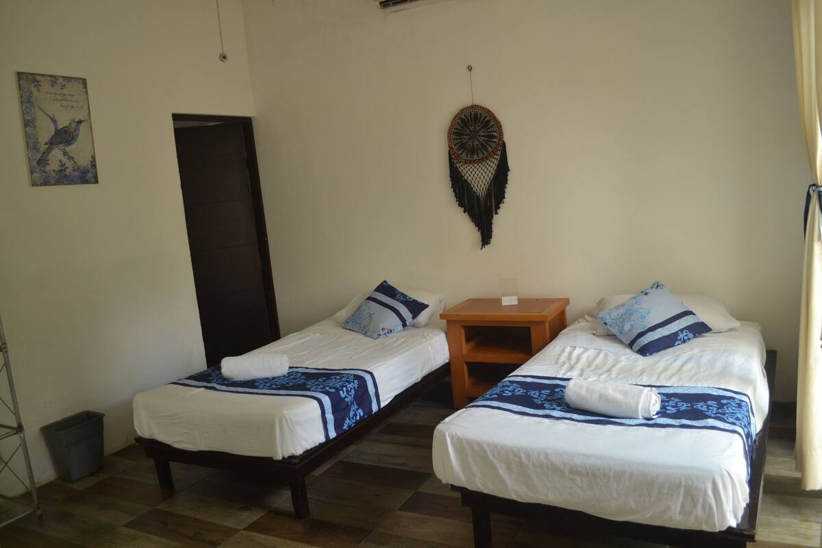 Basic Double Room, 2 Double Beds, Private Bathroom | Free WiFi, bed sheets