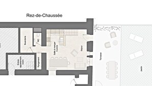 A floor plan of a maisonette with a living room, kitchen, bathroom, and a small balcony.