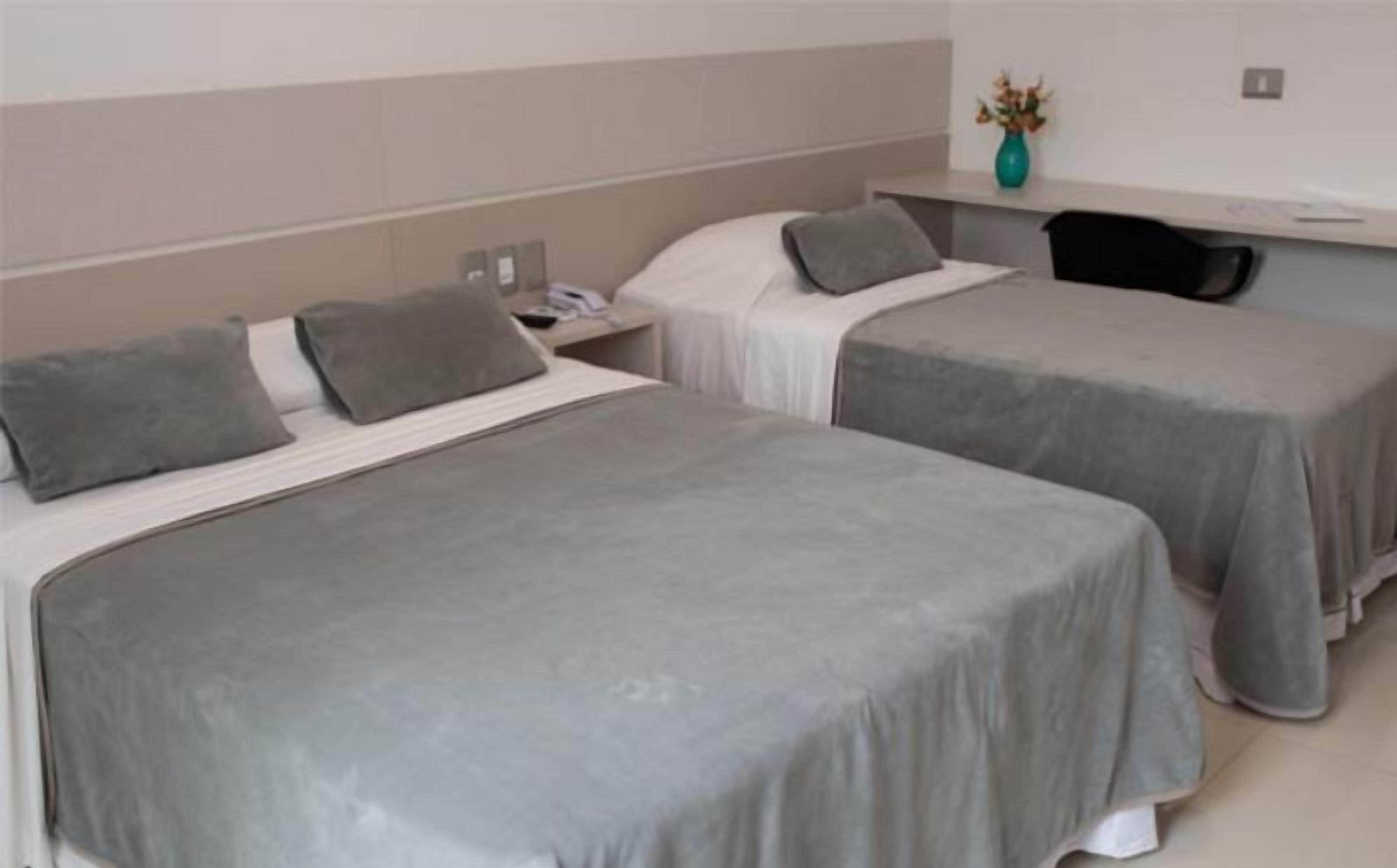 triple room | 1 bedroom, minibar, in-room safe, blackout curtains