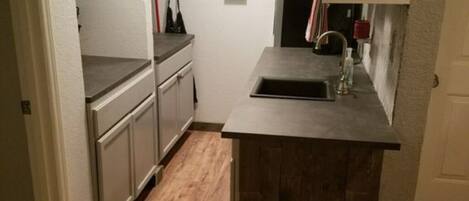 Fridge, microwave, coffee/tea maker, toaster