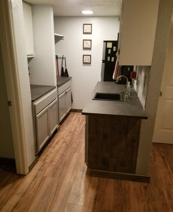 Fridge, microwave, coffee/tea maker, toaster