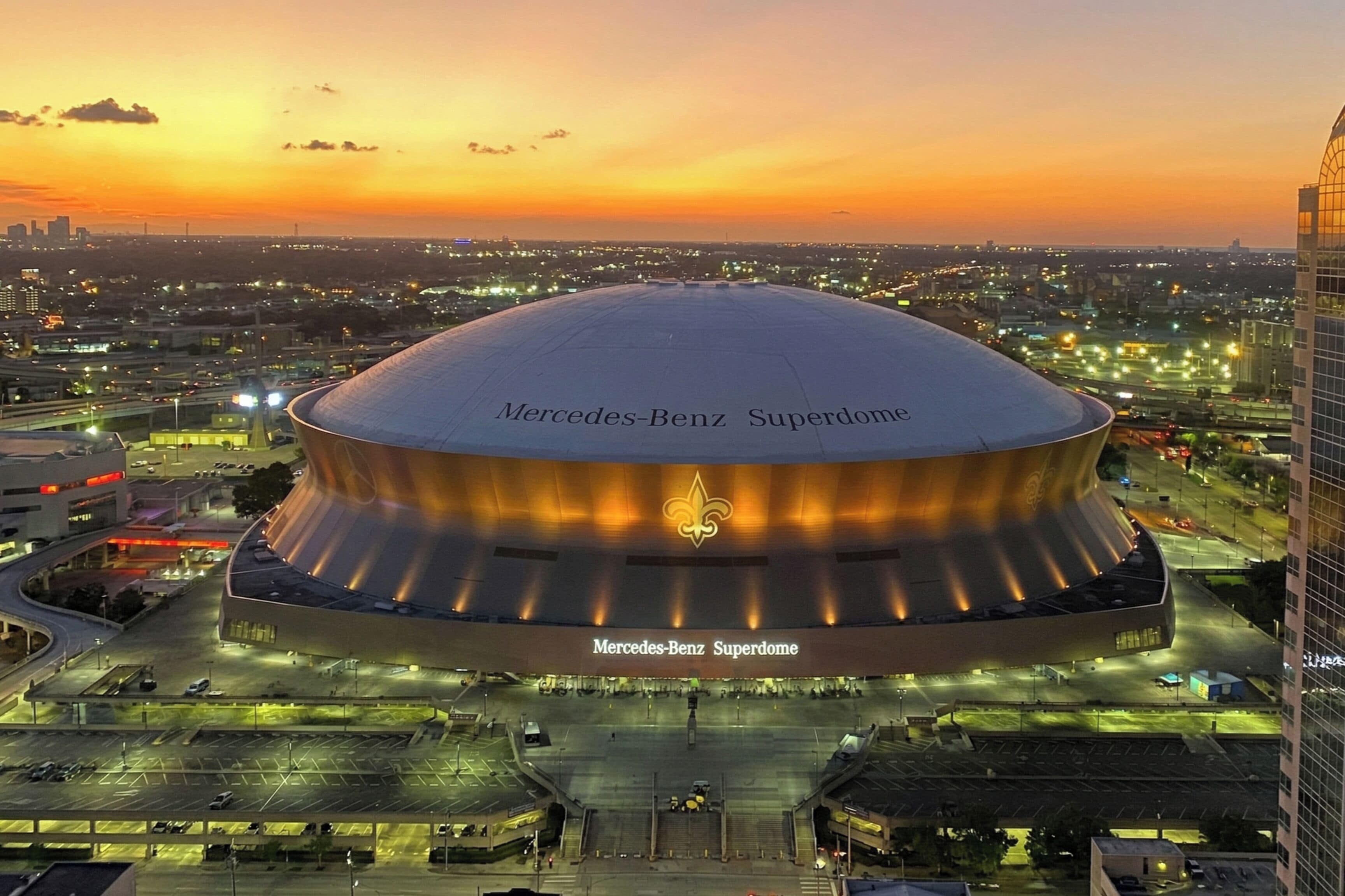 The Mercedes-Benz Superdome with a large, rounded roof and a prominent logo.
