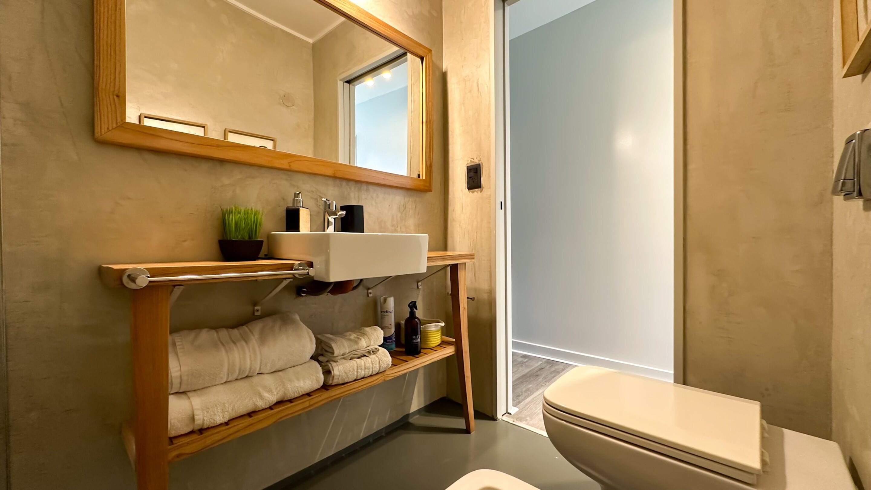 Superior Apartment (The Scandinavian) | Bathroom | Rainfall showerhead, hair dryer, slippers, bidet