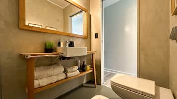 Superior Apartment (The Scandinavian) | Bathroom | Rainfall showerhead, hair dryer, slippers, bidet