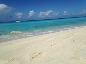 On the beach, sun-loungers, beach towels