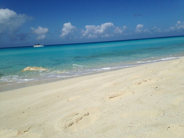On the beach, sun-loungers, beach towels
