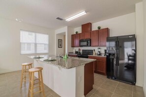 Apartment, Multiple Beds (5114 Compass Bay) | Private kitchen | Fridge, microwave, stovetop, dishwasher - 5114 Compass Bay (Kissimmee)