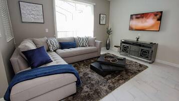 House, Multiple Beds (4888 Storey Lake) | Living room | Flat-screen TV, DVD player