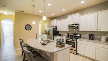 Apartment, Multiple Beds (4970 Trafalgar Village) | Private kitchen | Fridge, microwave, stovetop, dishwasher