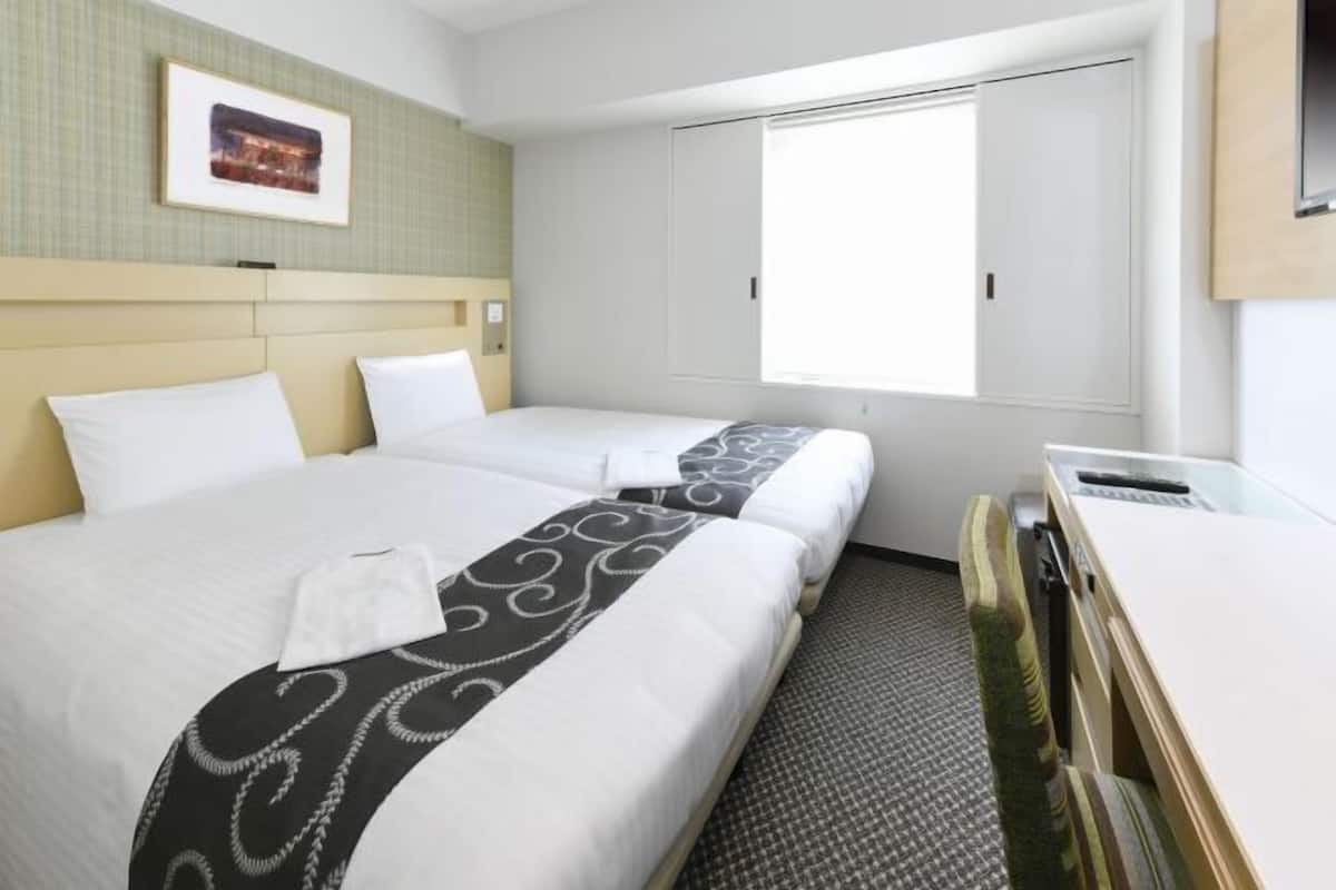 1 habitación, escritorio, wifi gratis y ropa de cama