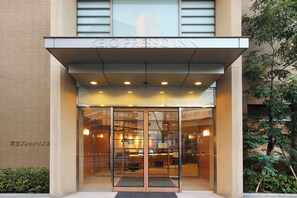 The entrance to KEIO PRESSO INN with a modern glass facade and a visible reception area inside. - Keio Presso Inn Nihonbashi Kayabacho (Tokyo)