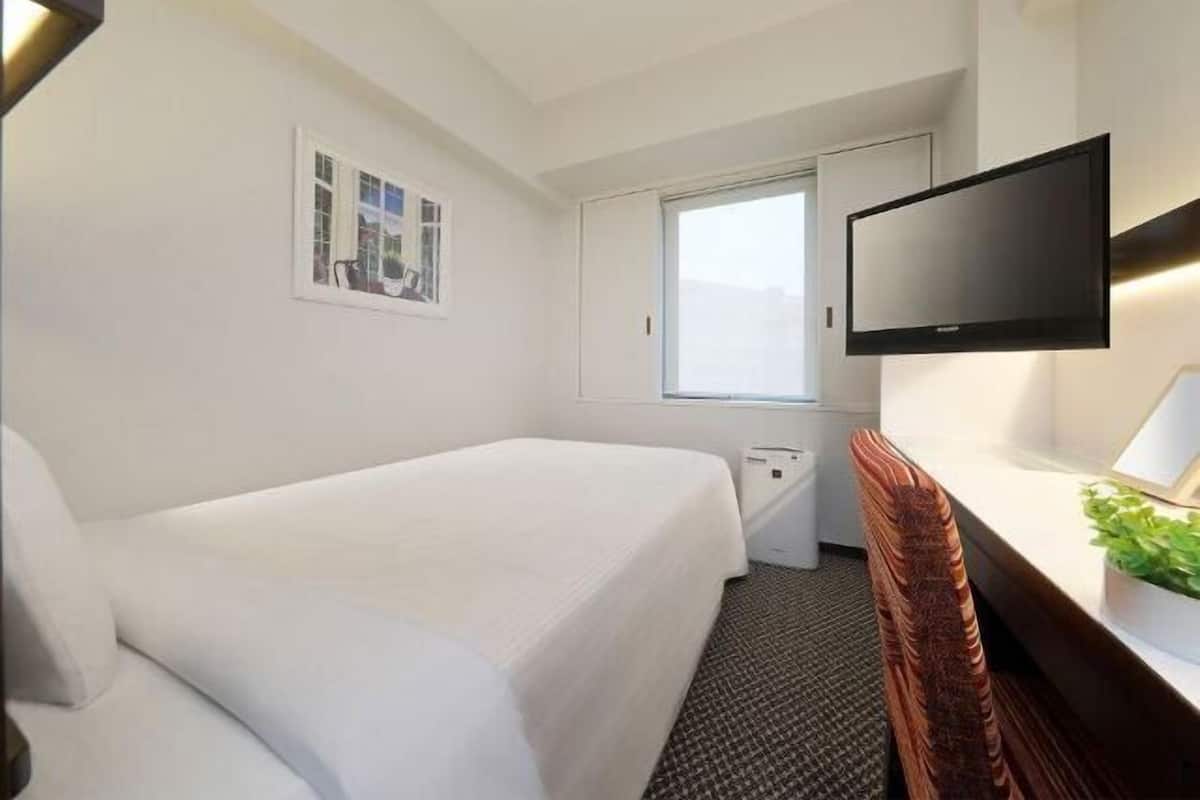 1 habitación, escritorio, wifi gratis y ropa de cama