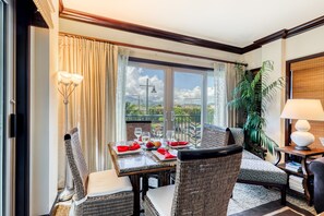 Enjoy a meal in the dining area with a view of the outdoors.
