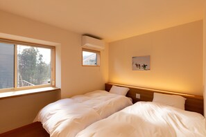 Lägenhet - 2 sovrum | Värdeförvaringsskåp på rummet och arbetsyta för laptop