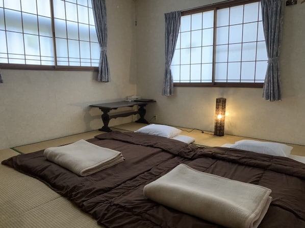 Economy Quadruple Room | Down comforters, blackout drapes, bed sheets - Restmance Pension Woody Hill (Myoko)