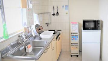 Fridge, microwave, stovetop, cookware/dishes/utensils