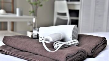 Hair dryer, towels, shampoo
